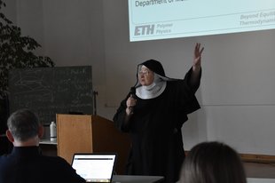 Sister Scholastica joking with the participants.