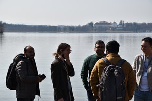 Discussions on the first day of the school. Herrenchiemsee island in the background.